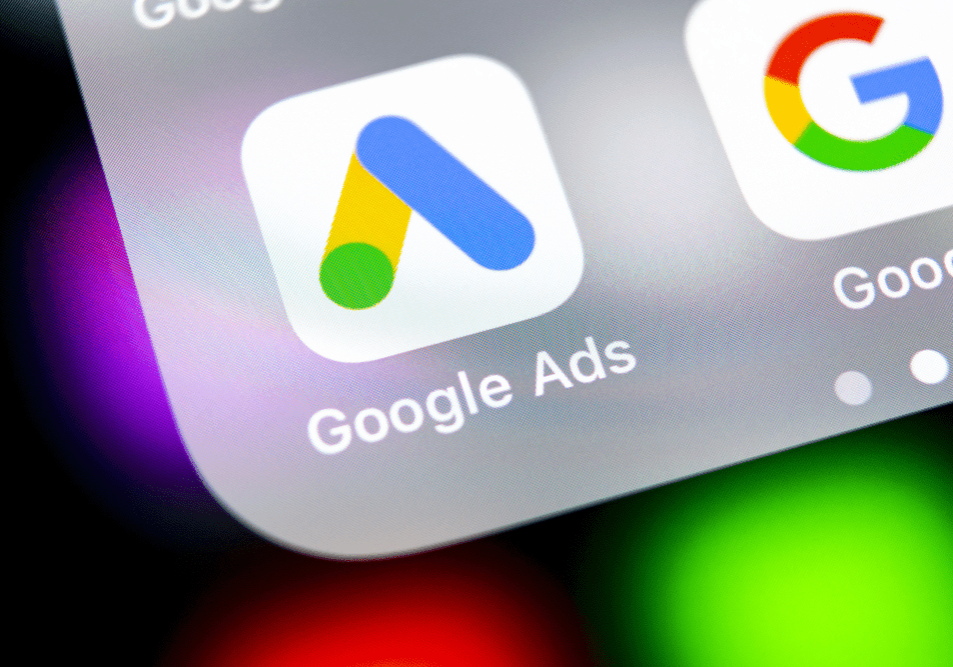 A close up of the google ads logo on an iphone.